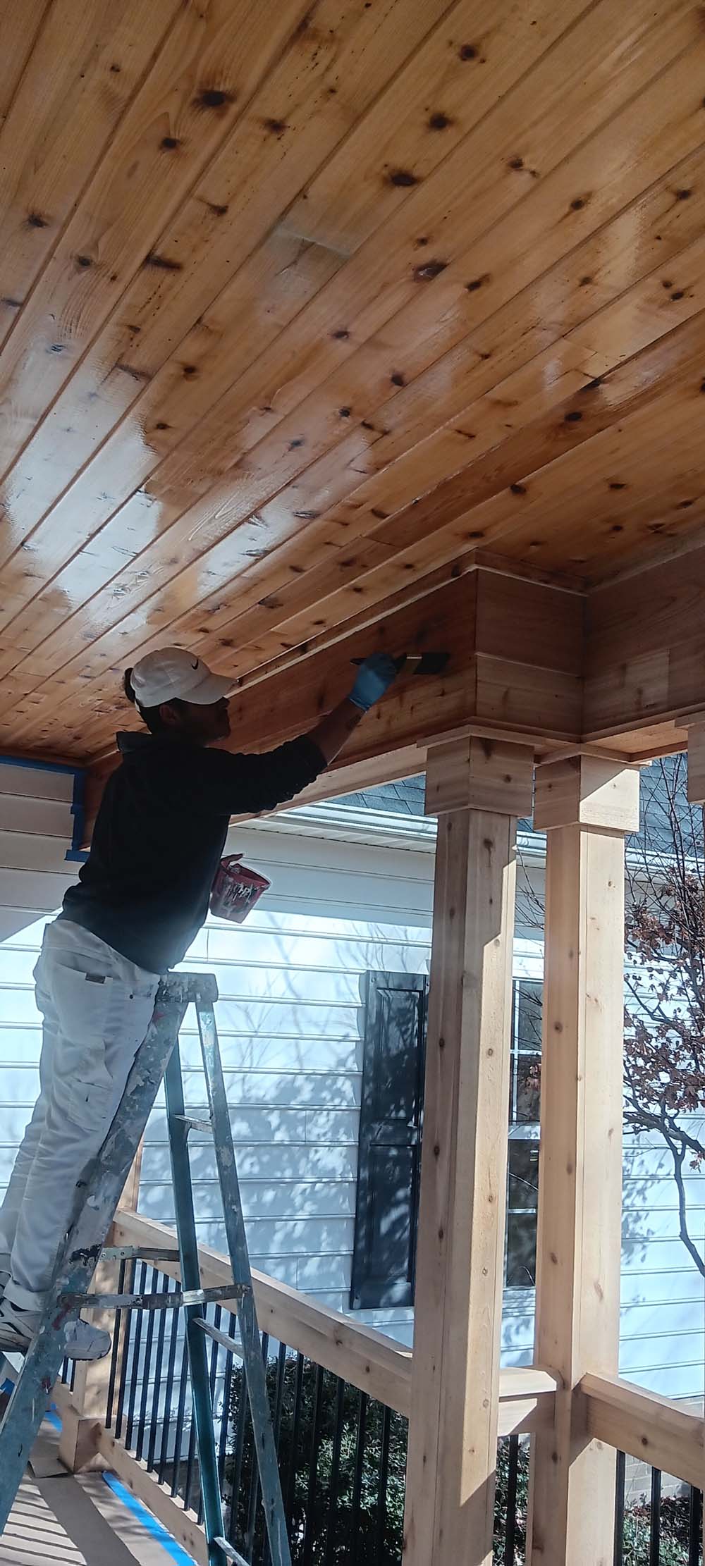 Clear finish applied to tongue and groove cedar ceiling